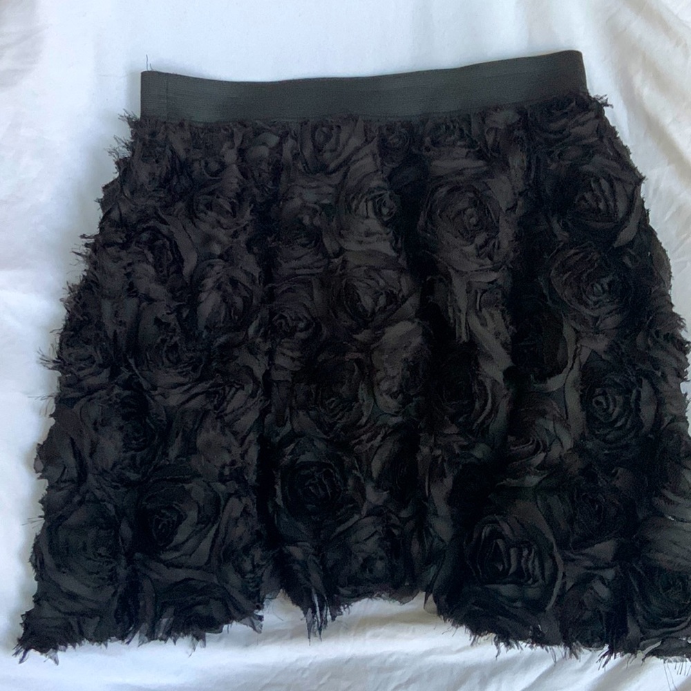 Free People Black skirt with textured roses, size 8.